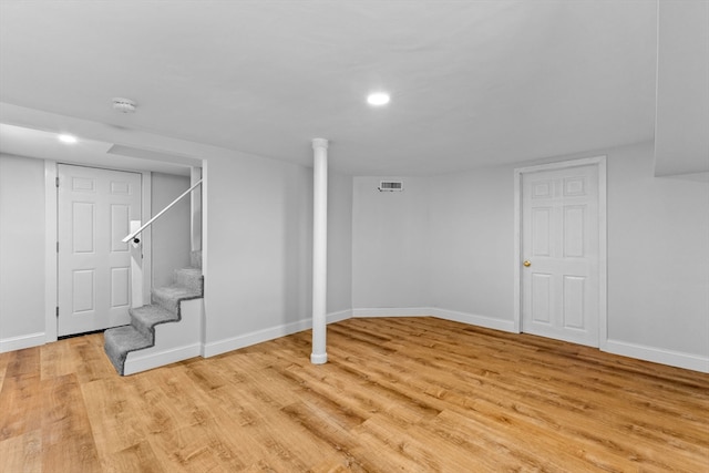 basement with light wood-type flooring