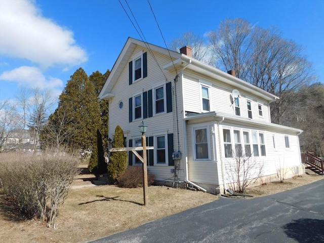 view of front of property featuring a chimney