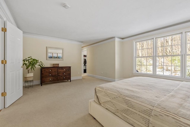 bedroom featuring crown molding, multiple windows, baseboards, and light colored carpet