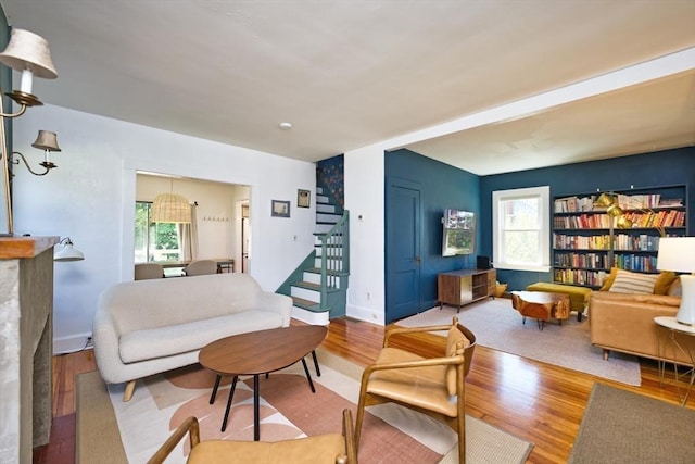 15 N Pleasant, Dartmouth, MA 02748 - living room with plenty of natural light, stairs, and wood finished floors