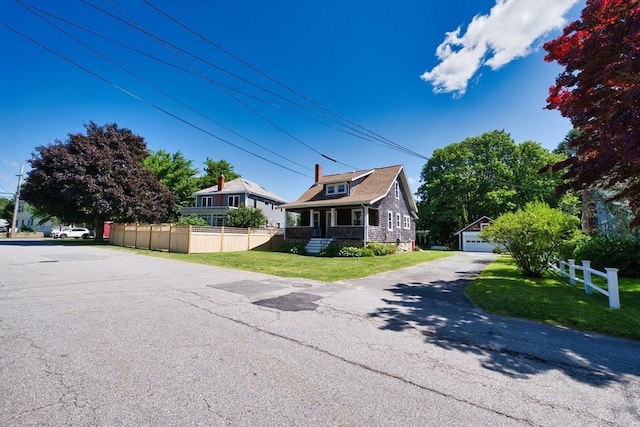 15 N Pleasant, Dartmouth, MA 02748 - view of front of property with an outdoor structure and a garage