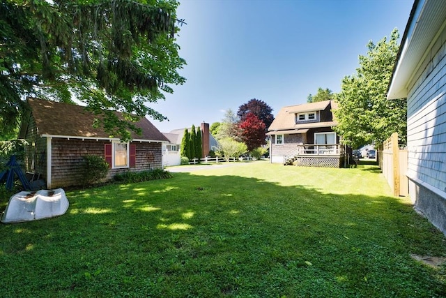 15 N Pleasant, Dartmouth, MA 02748 - view of yard featuring an outdoor structure and a wooden deck
