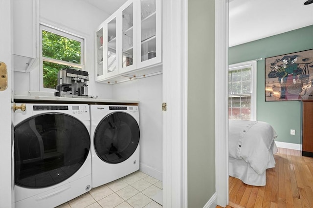 15 Keyes House Rd, Shrewsbury, MA 01545 - washroom featuring washer and dryer, baseboards, healthy amount of natural light, and cabinet space