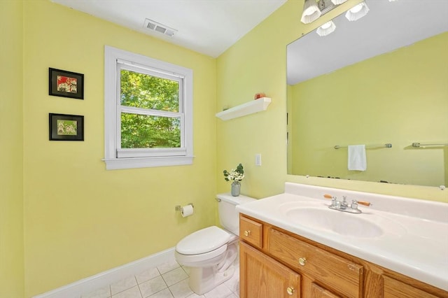15 Keyes House Rd, Shrewsbury, MA 01545 - half bath featuring toilet, vanity, tile patterned floors, and baseboards