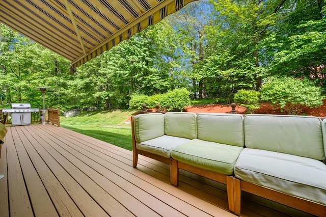 15 Keyes House Rd, Shrewsbury, MA 01545 - wooden terrace with outdoor lounge area, view of scattered trees, a lawn, and grilling area