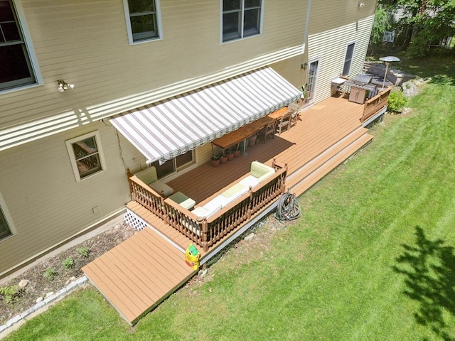 15 Keyes House Rd, Shrewsbury, MA 01545 - wooden deck with area for grilling and a lawn