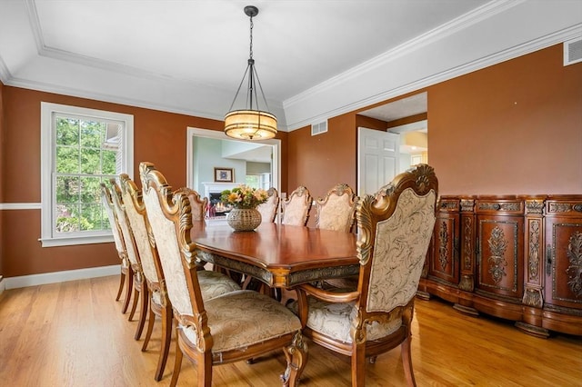 15 Keyes House Rd, Shrewsbury, MA 01545 - dining space with light wood-type flooring, baseboards, and ornamental molding