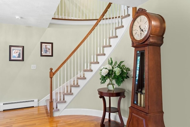 1 Burnham Ln, Danvers, MA 01923 - stairway with a baseboard radiator and wood finished floors