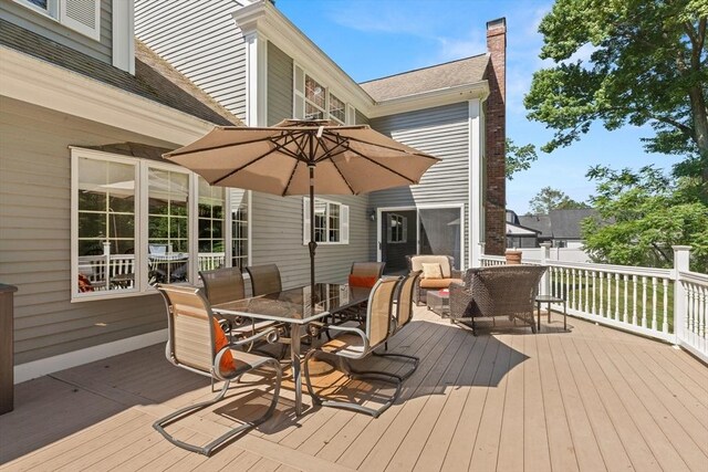 1 Burnham Ln, Danvers, MA 01923 - wooden deck with outdoor dining area