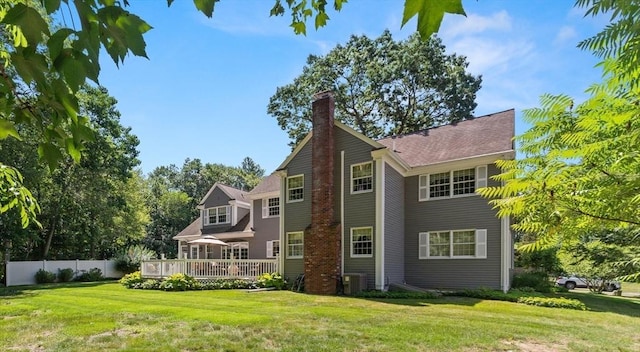 1 Burnham Ln, Danvers, MA 01923 - view of property exterior with a chimney and a deck
