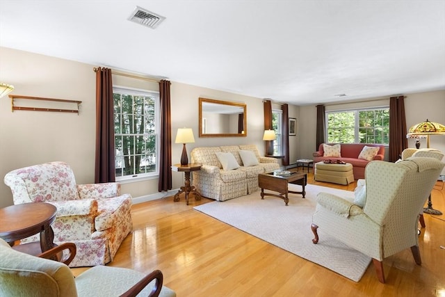 1 Burnham Ln, Danvers, MA 01923 - living room with light wood finished floors and baseboards