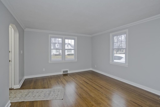 unfurnished room with dark wood-type flooring and ornamental molding