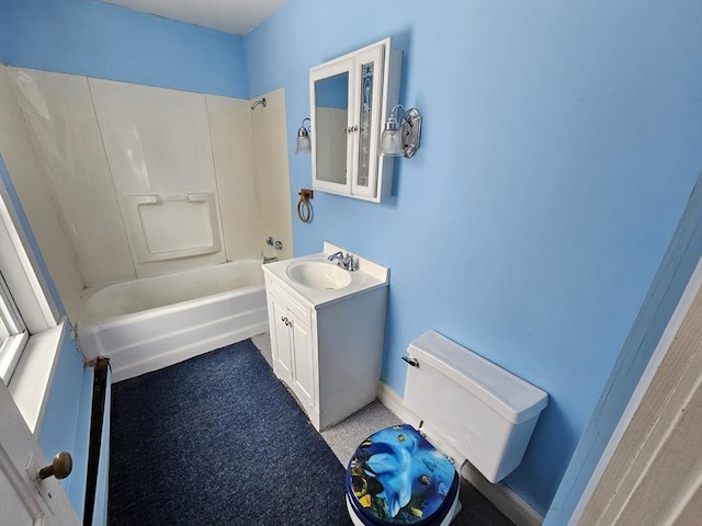 bathroom with washtub / shower combination, toilet, and vanity