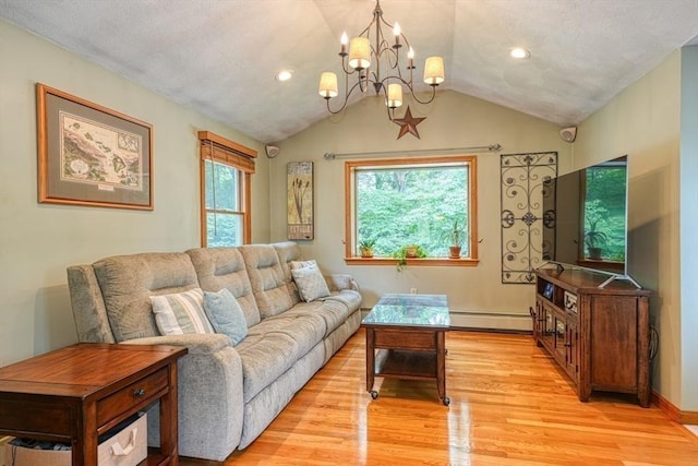 113 Edgehill Rd Unit 113, Norwood, MA 02062 - living area with light wood-type flooring, a baseboard radiator, a chandelier, lofted ceiling, and recessed lighting