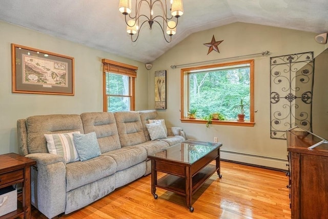 113 Edgehill Rd Unit 113, Norwood, MA 02062 - living room featuring a baseboard radiator, light wood-type flooring, a chandelier, and vaulted ceiling