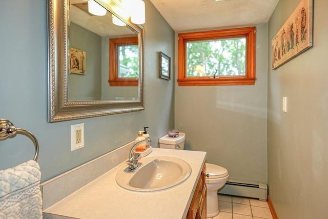113 Edgehill Rd Unit 113, Norwood, MA 02062 - bathroom with baseboard heating, vanity, and tile patterned flooring