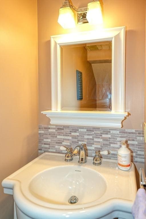 113 Edgehill Rd Unit 113, Norwood, MA 02062 - bathroom featuring vanity and decorative backsplash