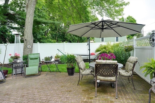 113 Edgehill Rd Unit 113, Norwood, MA 02062 - fenced backyard with outdoor dining space and a patio area