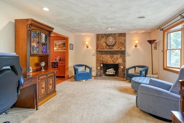 113 Edgehill Rd Unit 113, Norwood, MA 02062 - living area with a desk, light carpet, a fireplace, recessed lighting, and a textured ceiling