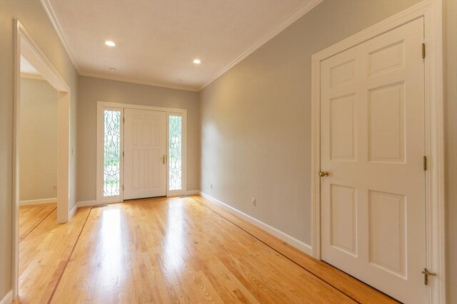 109 Wild Grove Ln, Longmeadow, MA 01106 - entrance foyer with baseboards, light wood finished floors, crown molding, and recessed lighting