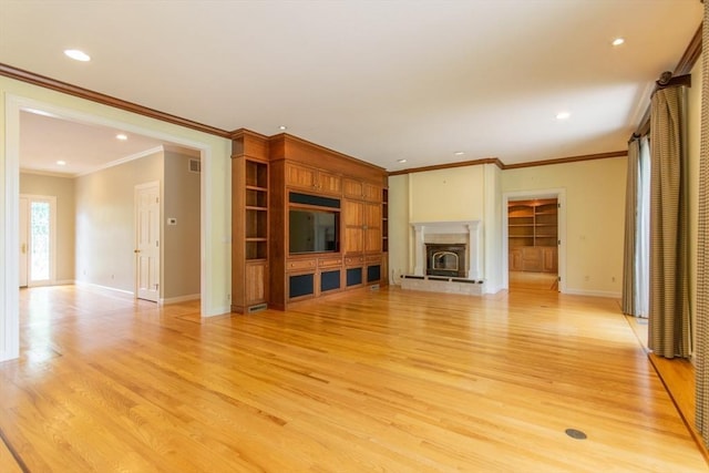 109 Wild Grove Ln, Longmeadow, MA 01106 - unfurnished living room featuring ornamental molding, light wood finished floors, baseboards, a stone fireplace, and recessed lighting
