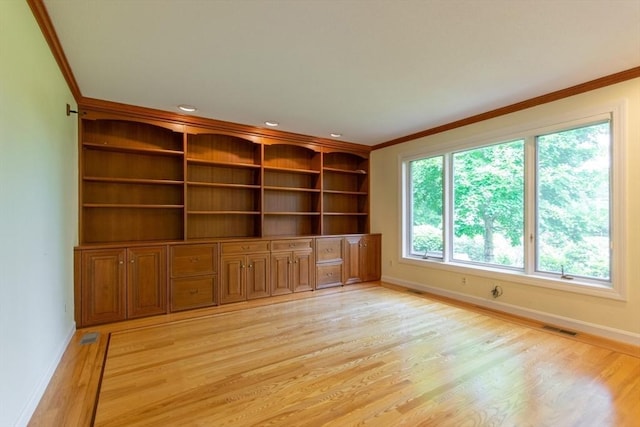109 Wild Grove Ln, Longmeadow, MA 01106 - spare room featuring crown molding, light wood-style floors, and baseboards
