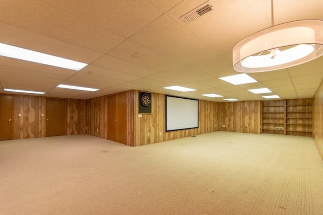 109 Wild Grove Ln, Longmeadow, MA 01106 - finished below grade area featuring carpet floors, wood walls, and a paneled ceiling