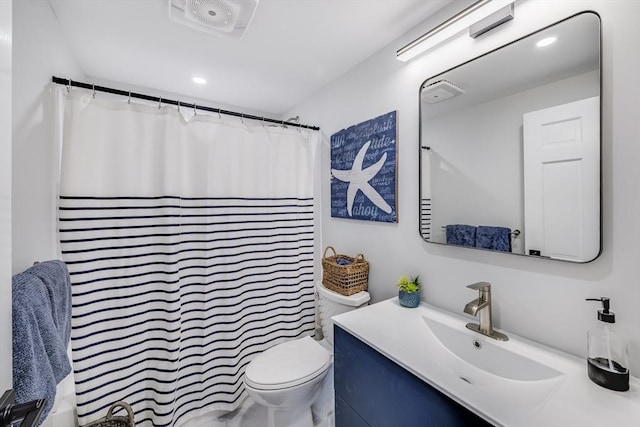 full bathroom featuring toilet, vanity, recessed lighting, and curtained shower