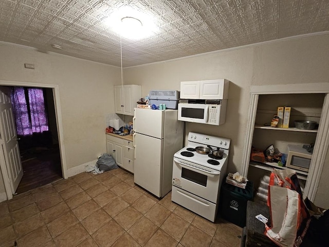 21 John, Worcester, MA 01609 - kitchen with white cabinets, ornamental molding, and white appliances