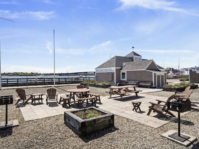 view of patio / terrace featuring fence