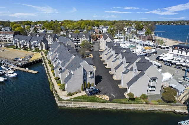 aerial view featuring a water view and a residential view