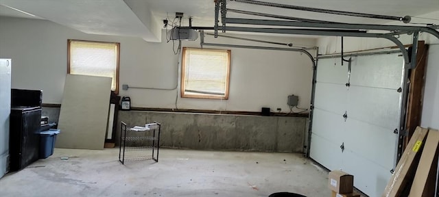 107 Chestnut Cir, Randolph, MA 02368 - garage featuring a garage door opener
