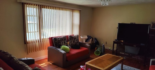 107 Chestnut Cir, Randolph, MA 02368 - living room with baseboards and wood finished floors
