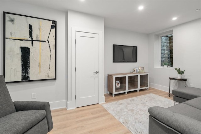 2202 Commonwealth Ave Unit 3, Newton, MA 02466 - living room featuring light wood finished floors and recessed lighting