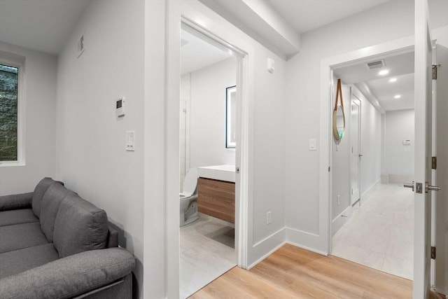 2202 Commonwealth Ave Unit 3, Newton, MA 02466 - corridor with light wood-style flooring and recessed lighting
