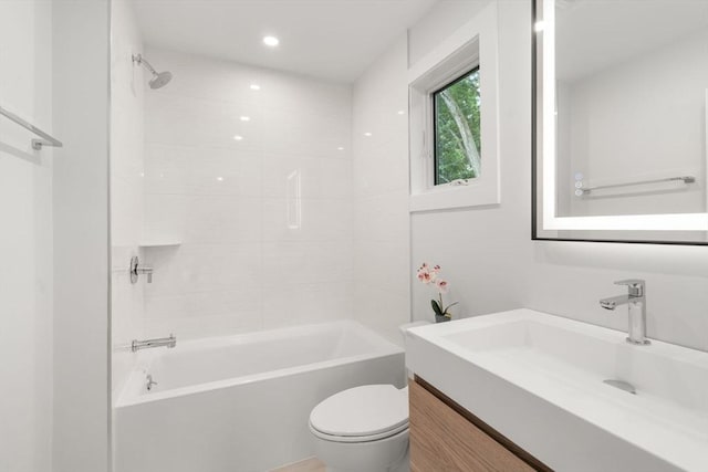 2202 Commonwealth Ave Unit 3, Newton, MA 02466 - bathroom featuring vanity, washtub / shower combination, and recessed lighting
