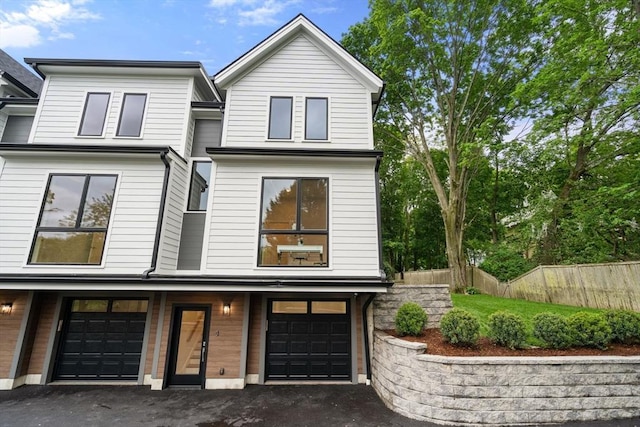 2202 Commonwealth Ave Unit 3, Newton, MA 02466 - view of front facade featuring a garage and driveway