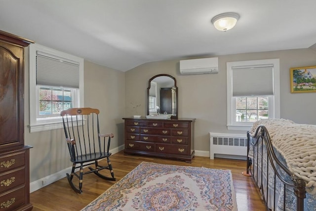 bedroom with radiator heating unit, multiple windows, a wall mounted air conditioner, and lofted ceiling