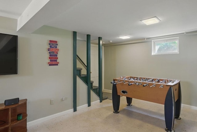 rec room with baseboards