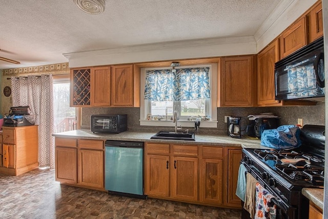 kitchen featuring a textured ceiling, sink, ornamental molding, and black appliances