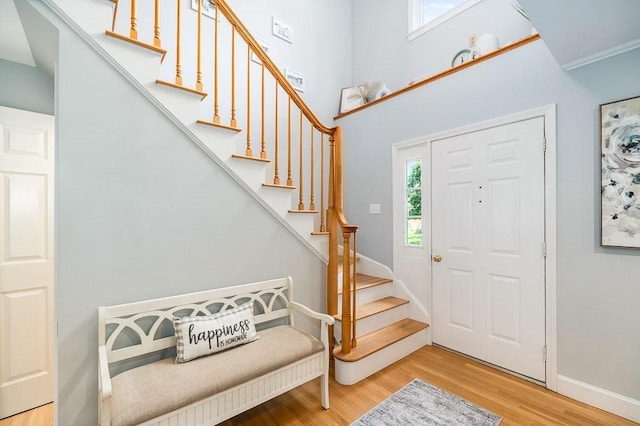31 Orchard Rd, Hamilton, MA 01982 - entrance foyer featuring wood finished floors and stairs