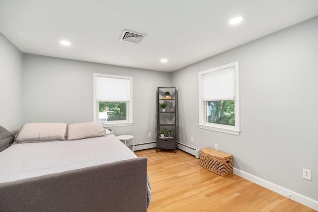 31 Orchard Rd, Hamilton, MA 01982 - bedroom with baseboard heating, light wood finished floors, and recessed lighting
