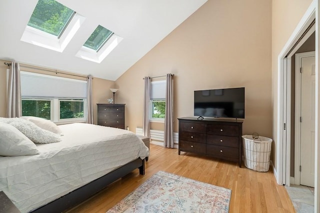 31 Orchard Rd, Hamilton, MA 01982 - bedroom with a skylight, wood finished floors, and high vaulted ceiling