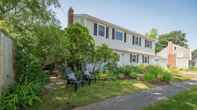 31 Orchard Rd, Hamilton, MA 01982 - view of front of property featuring a chimney and a garage