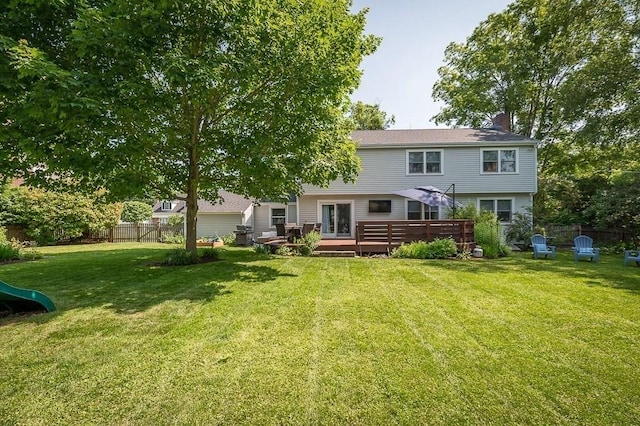 31 Orchard Rd, Hamilton, MA 01982 - rear view of house with a chimney and a deck