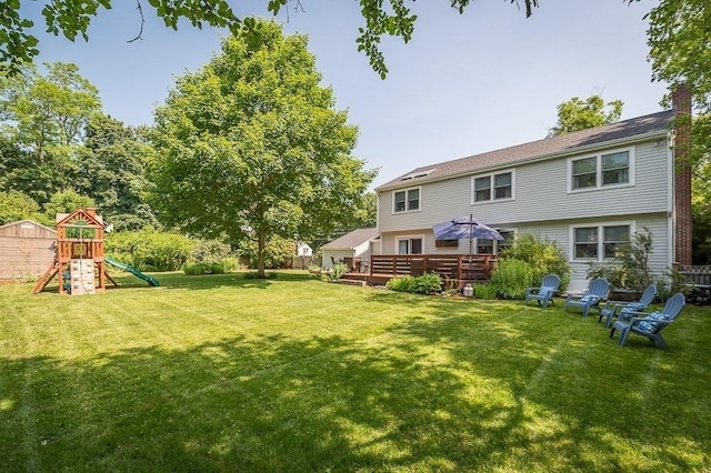 31 Orchard Rd, Hamilton, MA 01982 - view of yard with a playground and a deck