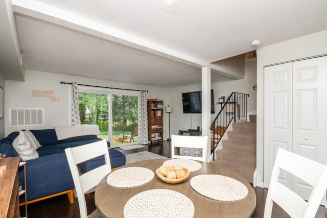 3 Beals Cv Unit F, Hingham, MA 02043 - dining room with stairs and a textured ceiling