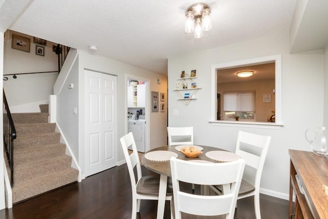 3 Beals Cv Unit F, Hingham, MA 02043 - dining area featuring washing machine and clothes dryer, stairway, dark wood-style floors, baseboards, and a textured ceiling