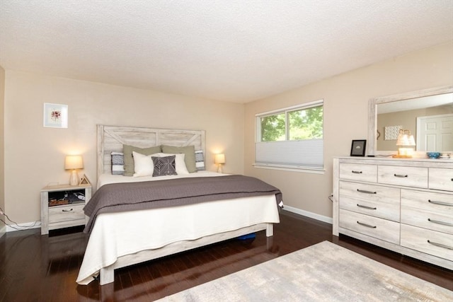 3 Beals Cv Unit F, Hingham, MA 02043 - bedroom featuring dark wood-type flooring and baseboards