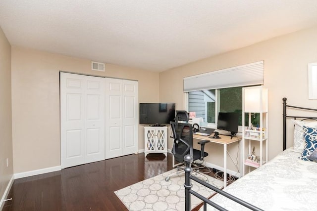 3 Beals Cv Unit F, Hingham, MA 02043 - bedroom with baseboards, an office area, wood finished floors, and a closet